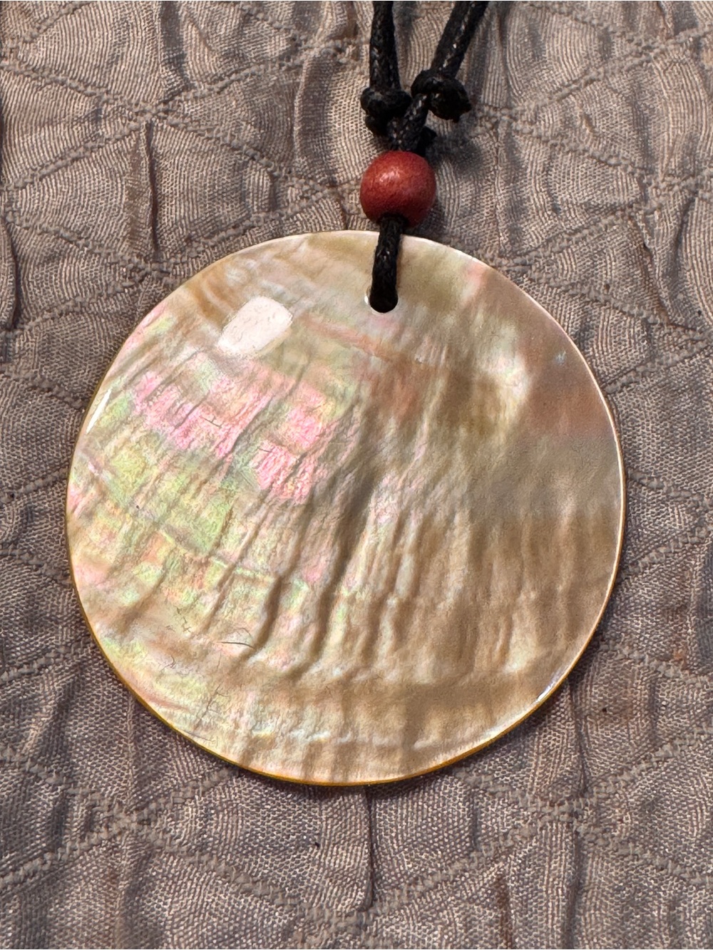 Round Mother of Pearl Pendant Necklace in Iridescent Gold